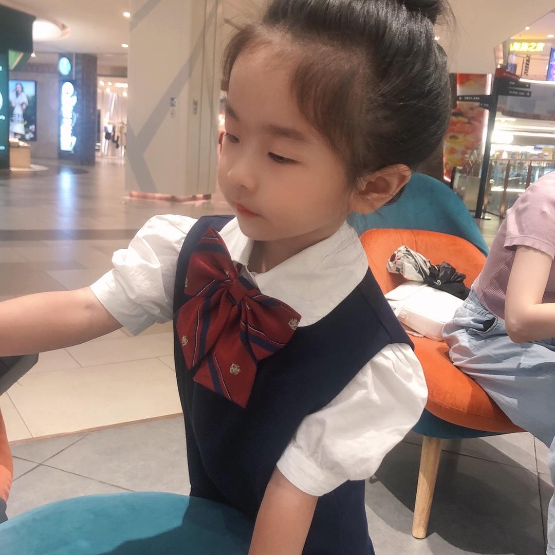 罗