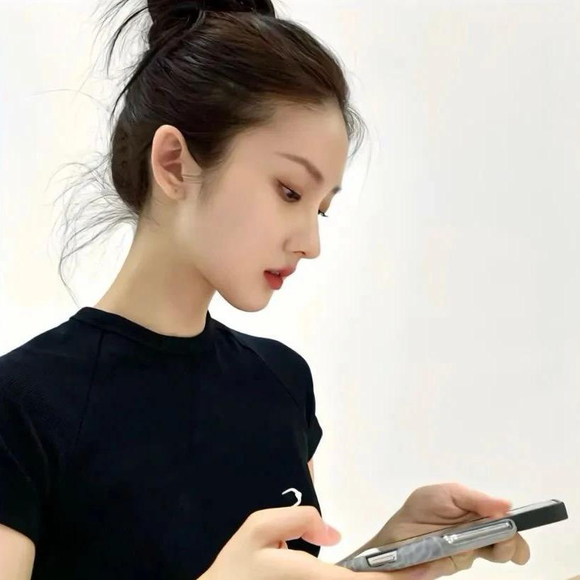 妮.