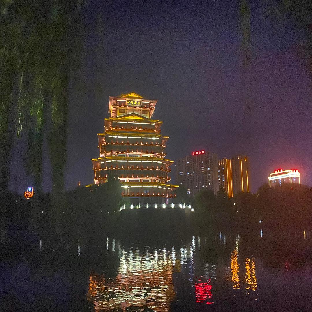 覃