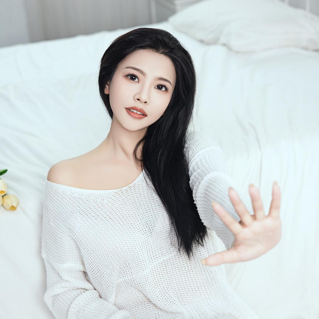 文婕（花开了）