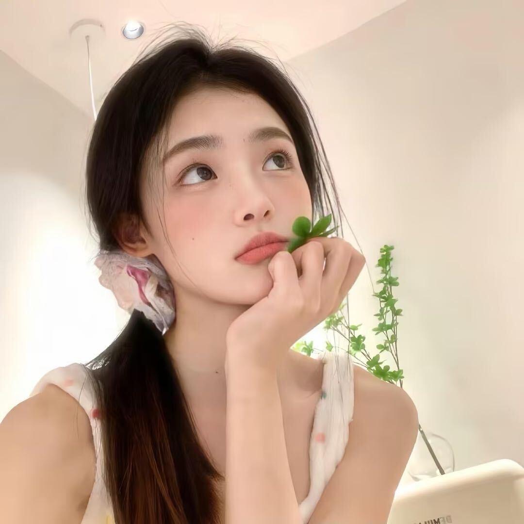 二 毛