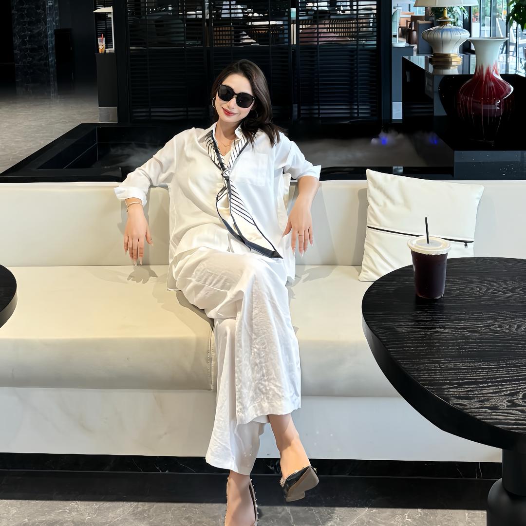 覃美丽.
