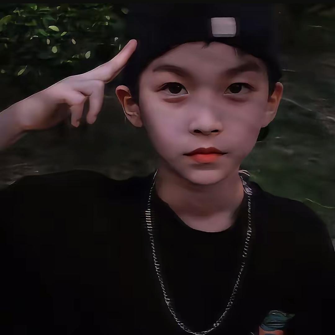 T.