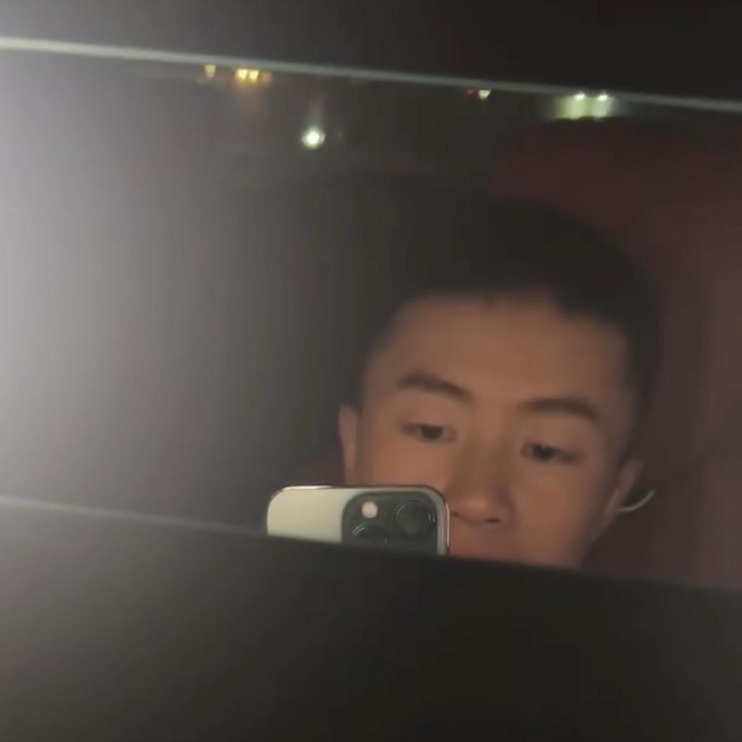 L.