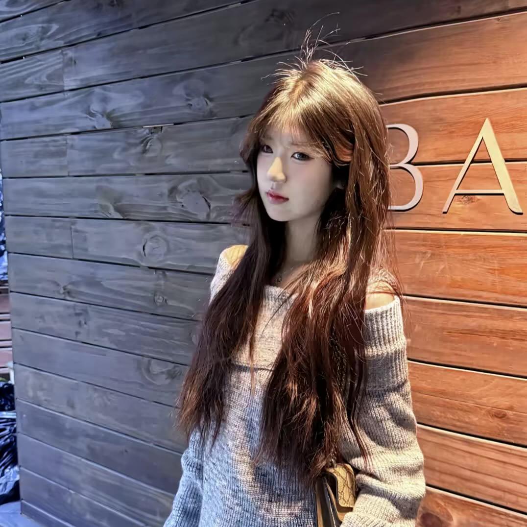 L.