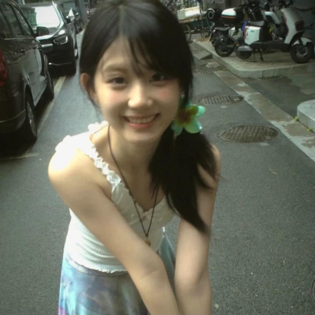 扎马尾看周杰伦.