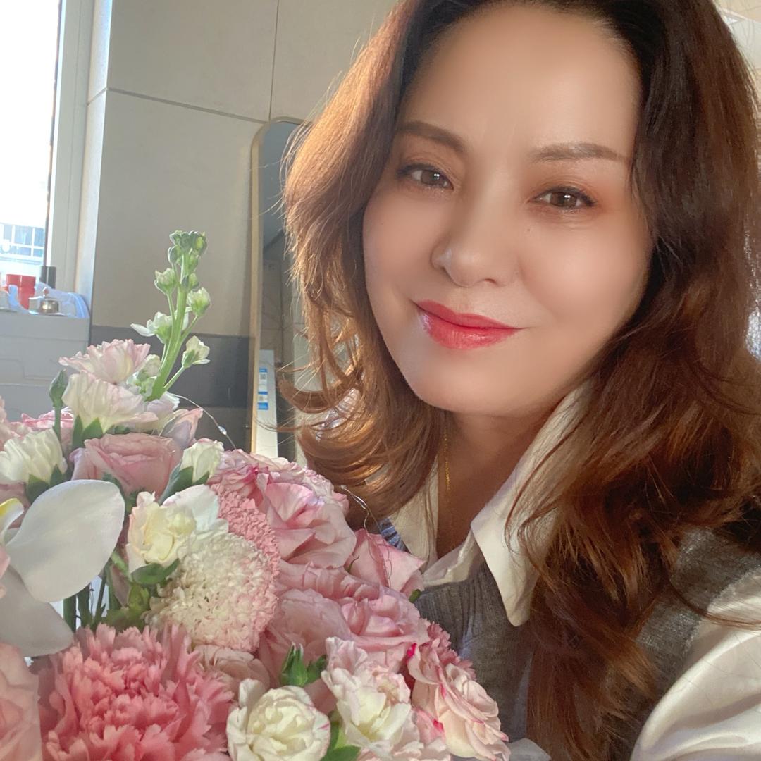 妈妈像花儿一样……