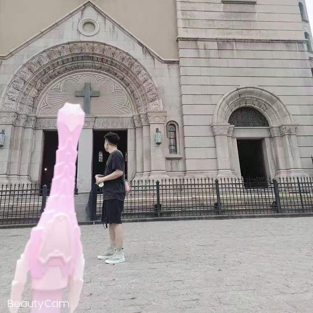 李..