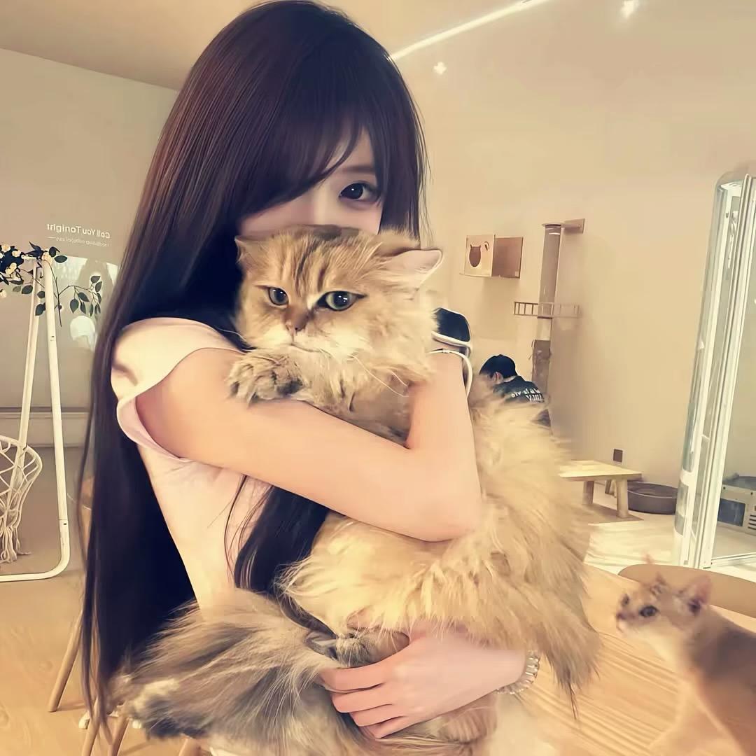 曼.