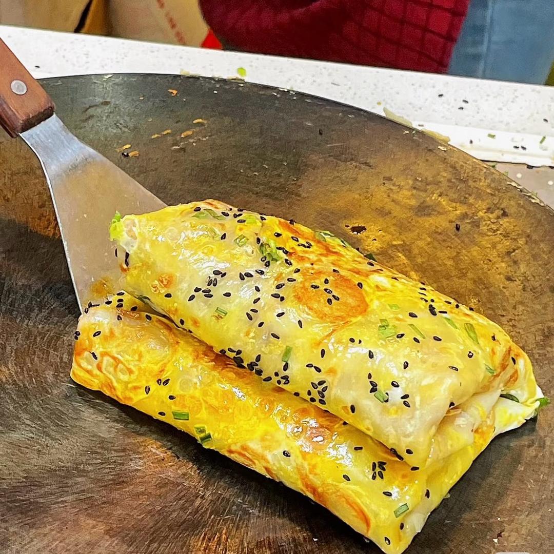 政豪吃鸡蛋饼
