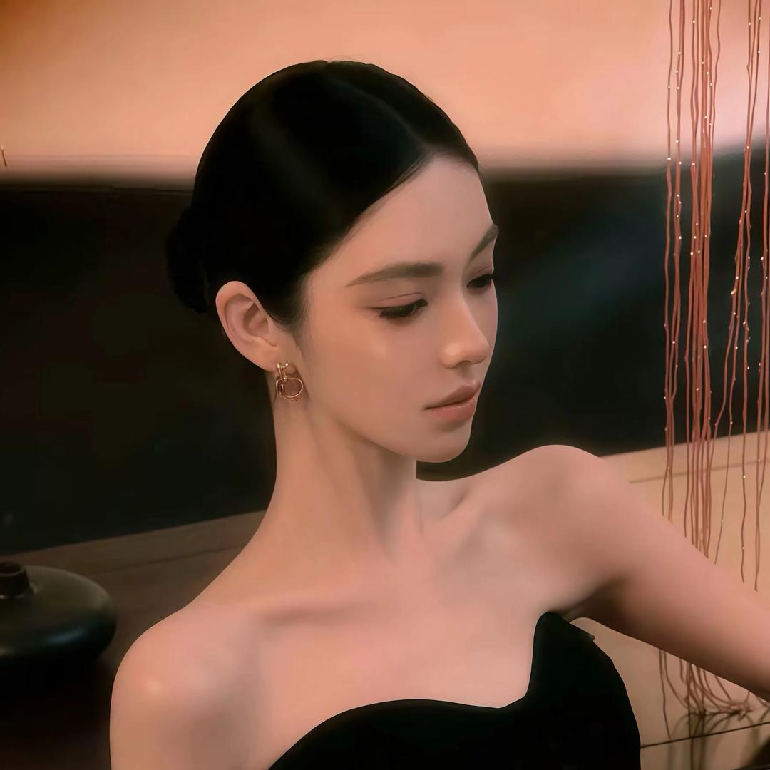 萬.