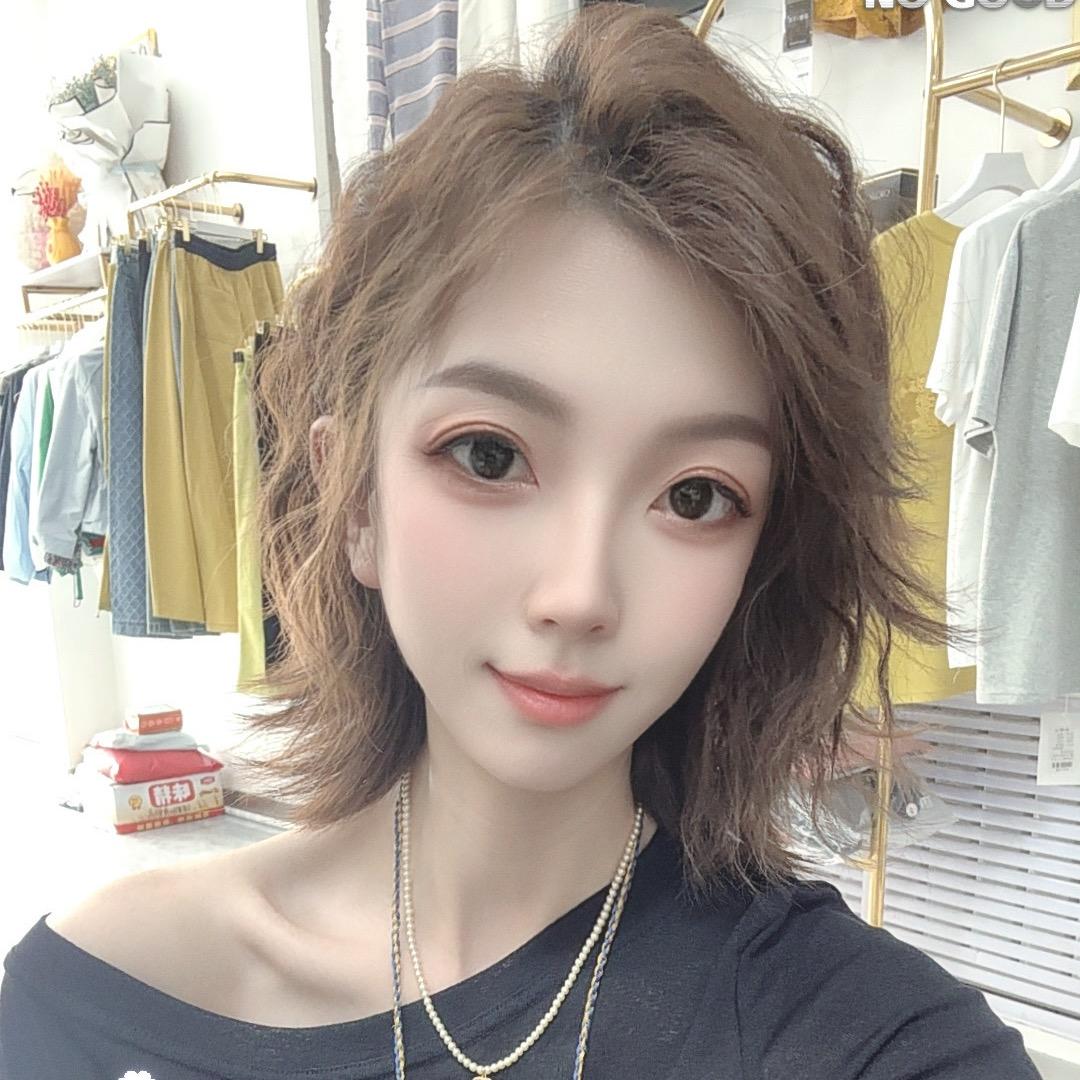 唯依女装（乌达书香苑西门）