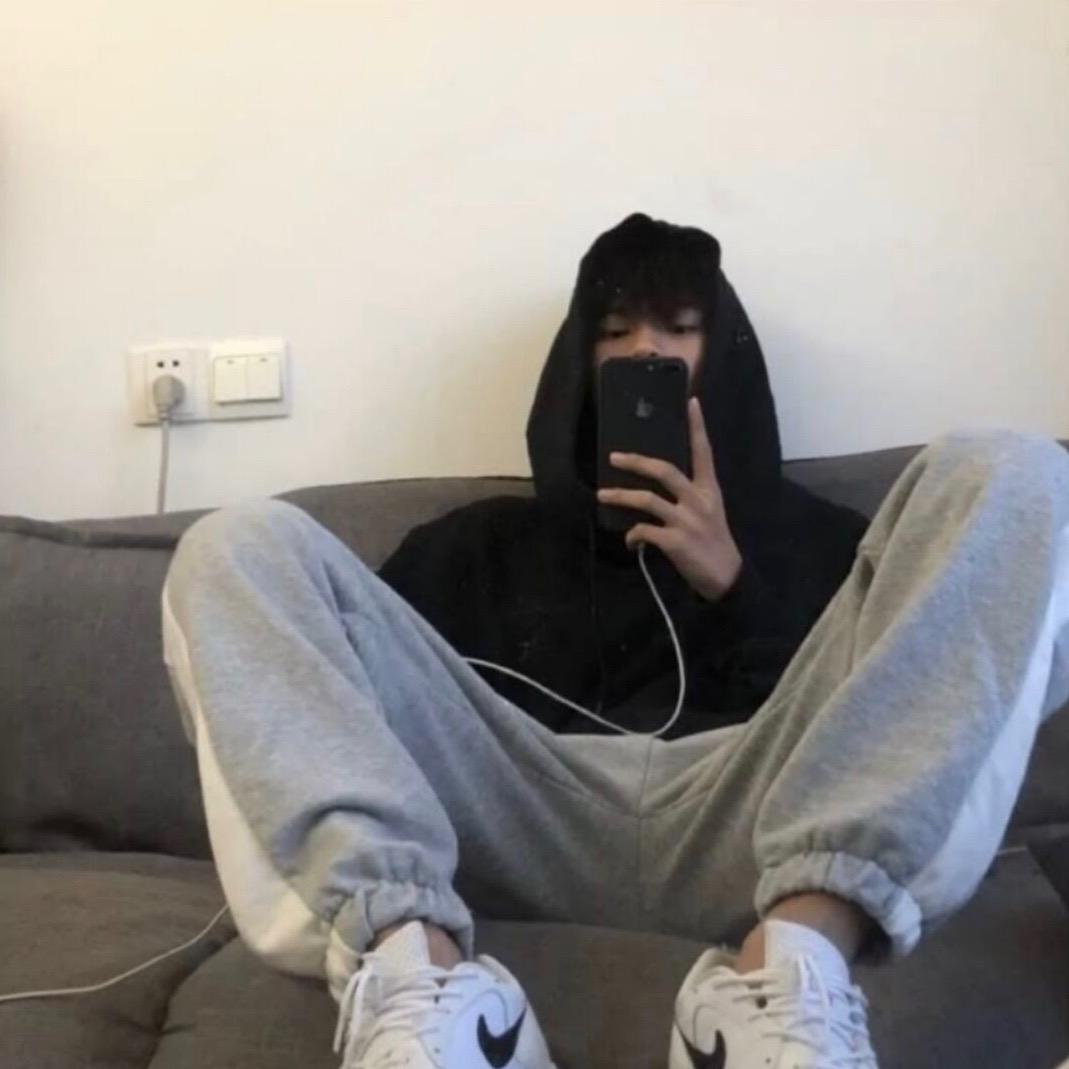 T.