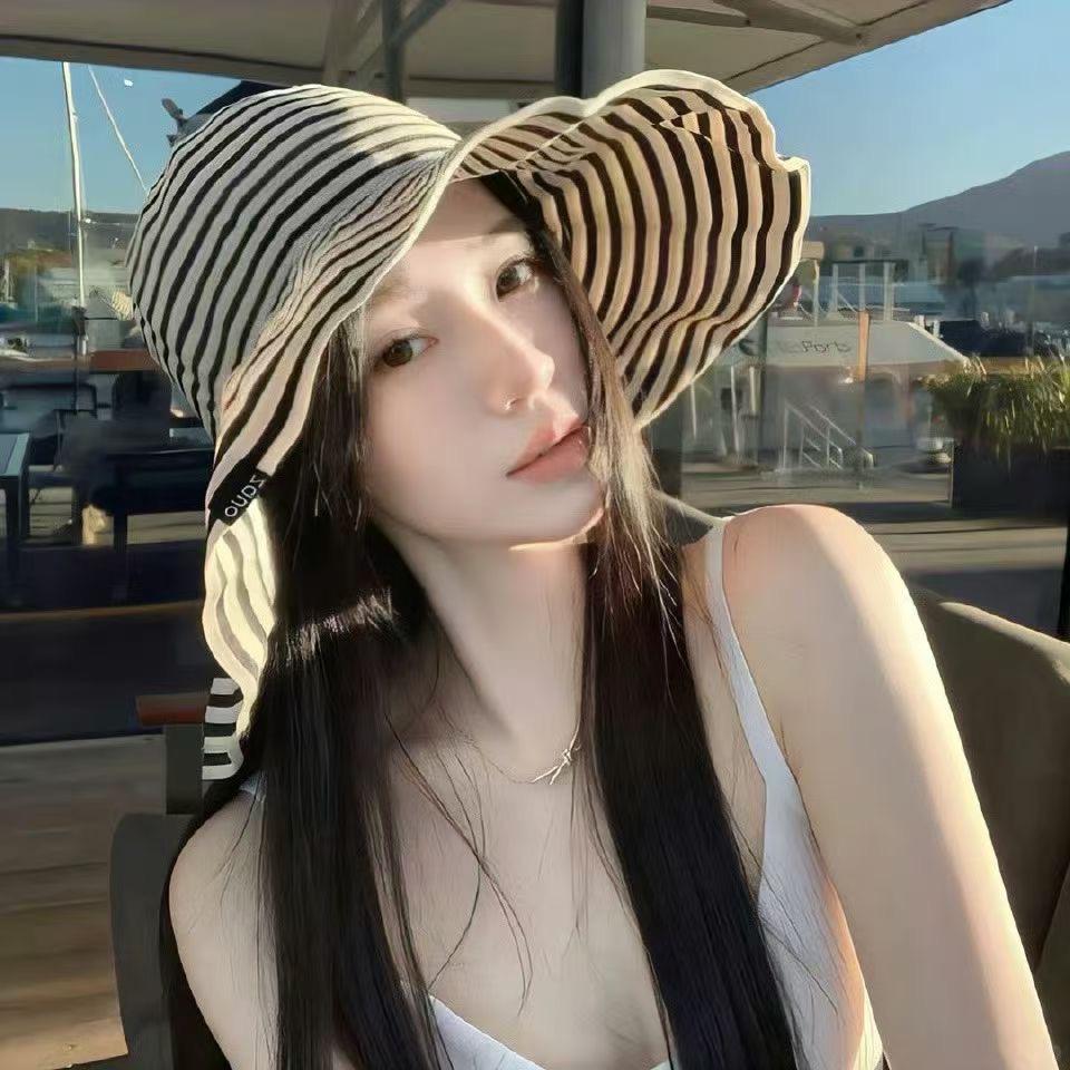 小L.