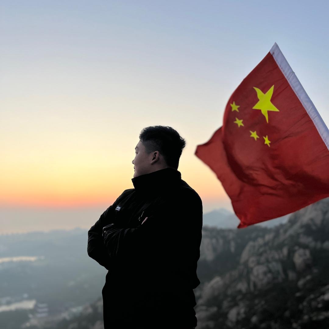 金明.