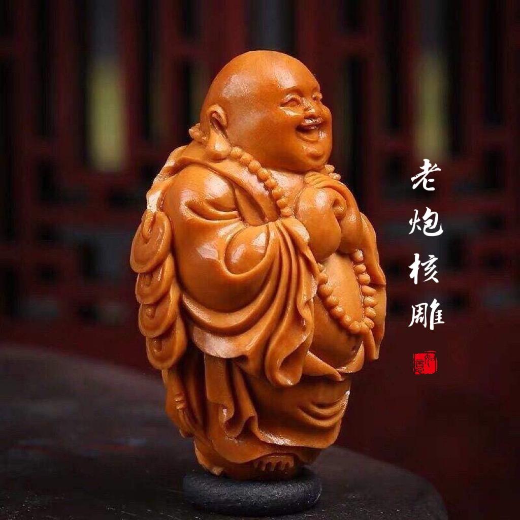 老炮橄榄核雕店