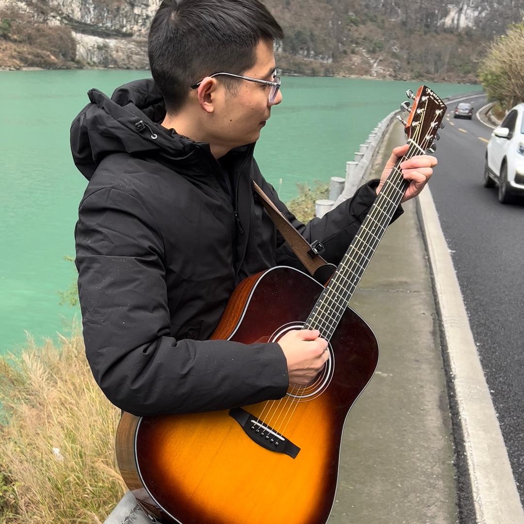 谦梦吉他