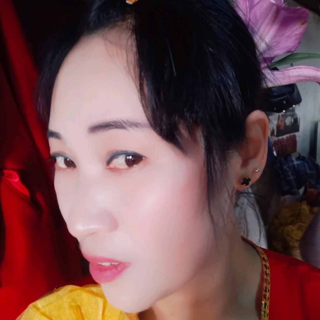 丽.