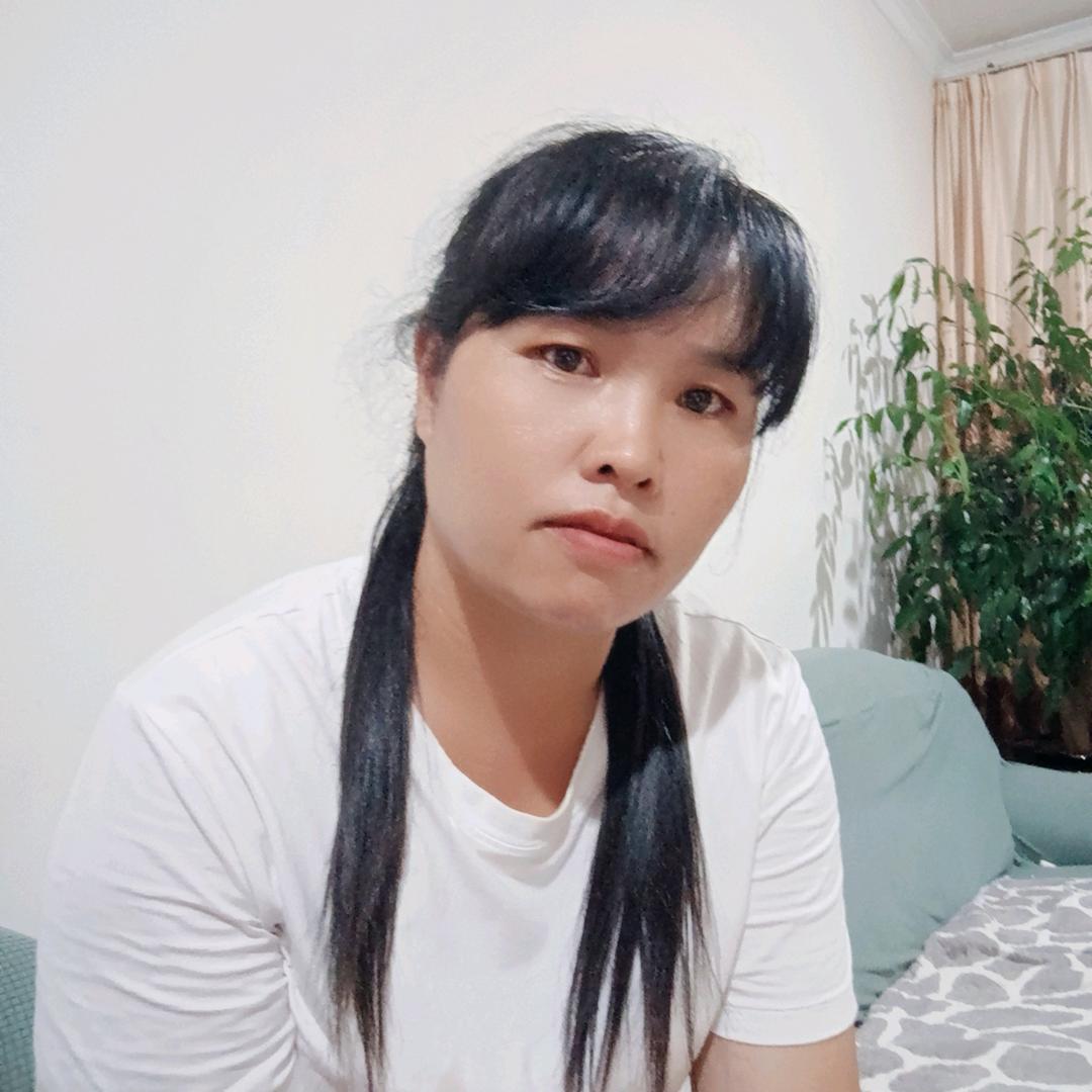 何丽