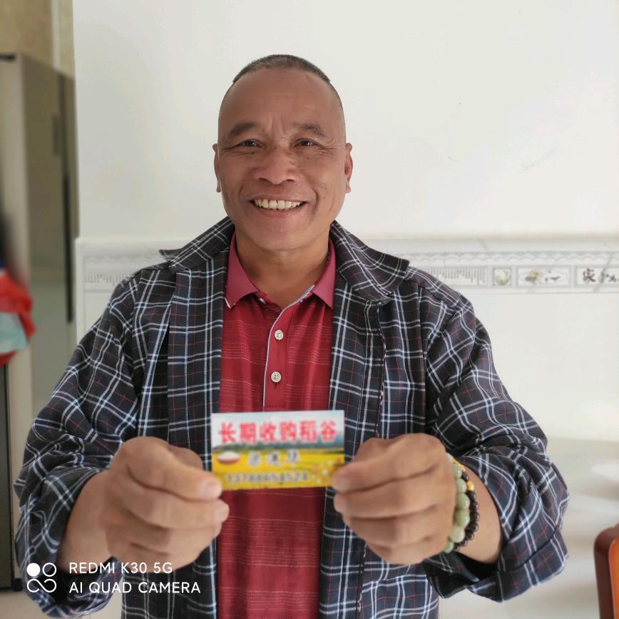 梁进华 长期收稻谷