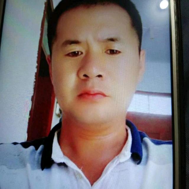 何佩成