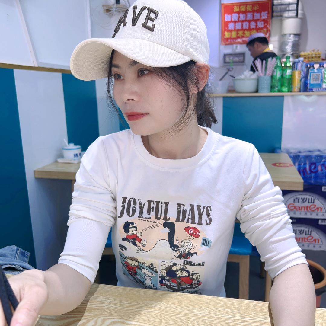 嫣然