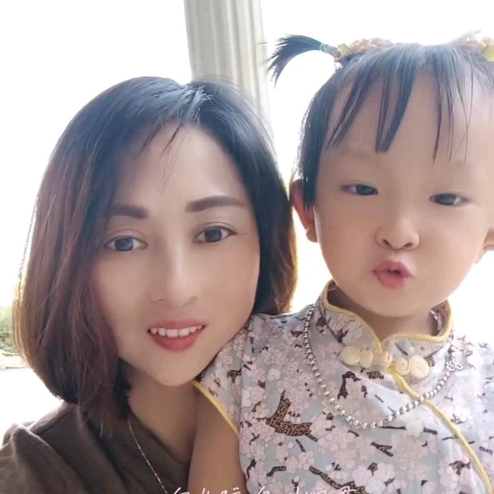 邱君