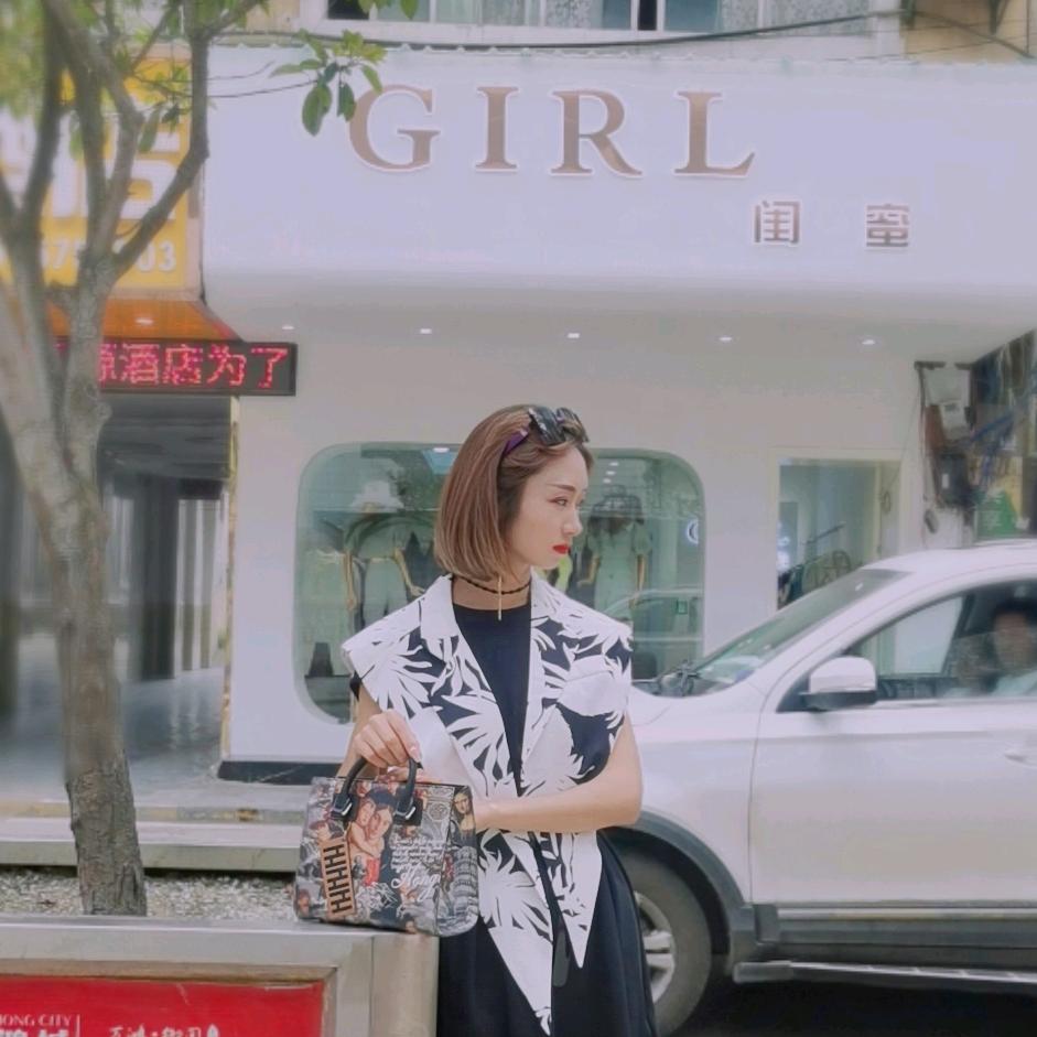 沐倾原创设计女装、朵儿