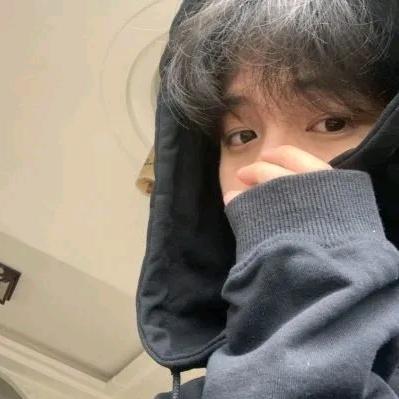 哝