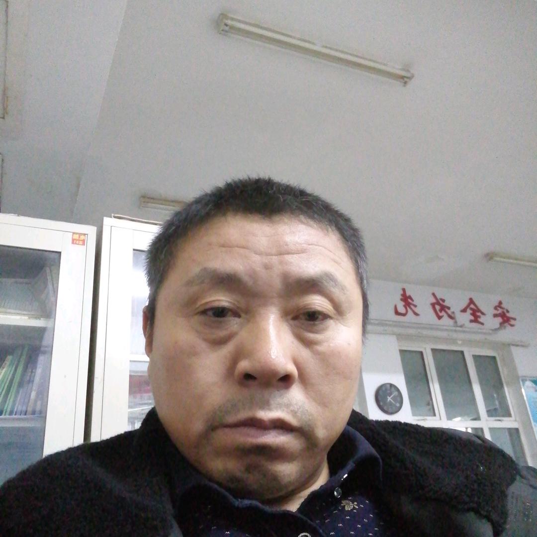 老何