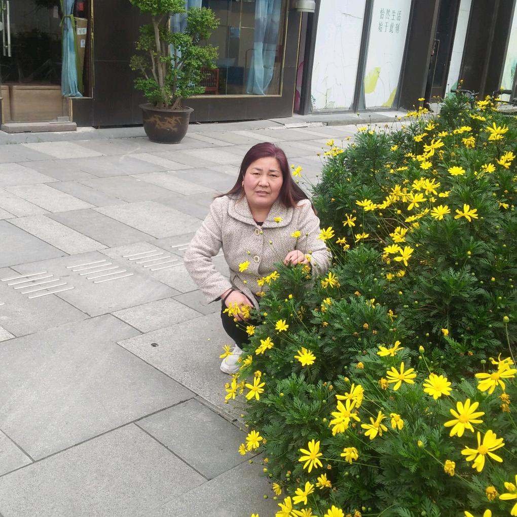 梁女士