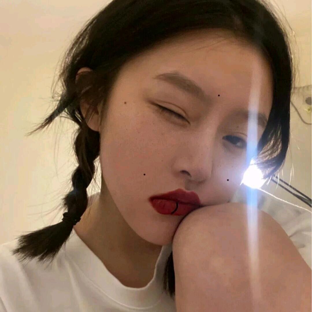 七七