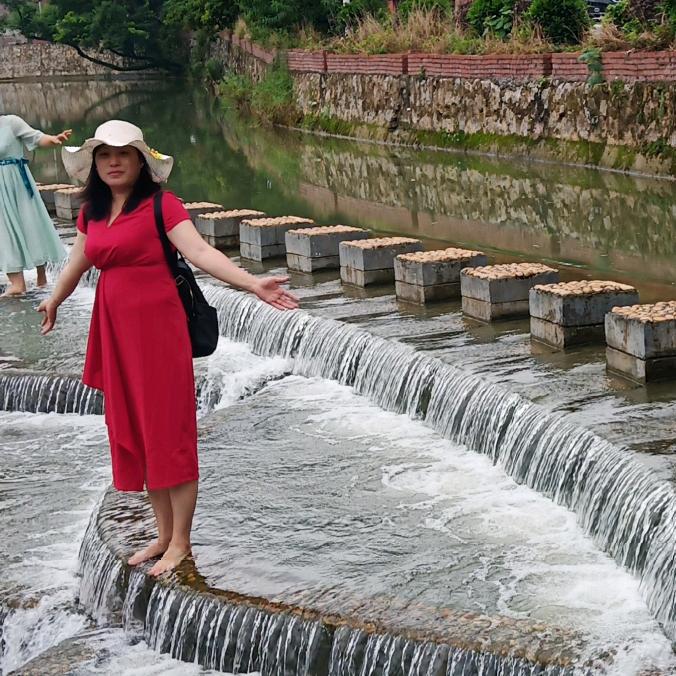 邓秀荣（做旅游）