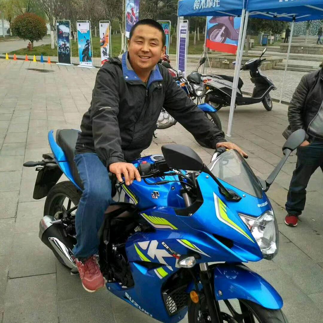 修摩托滴老王