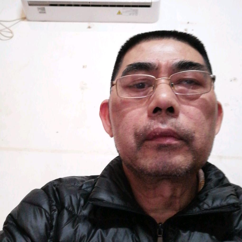 罗