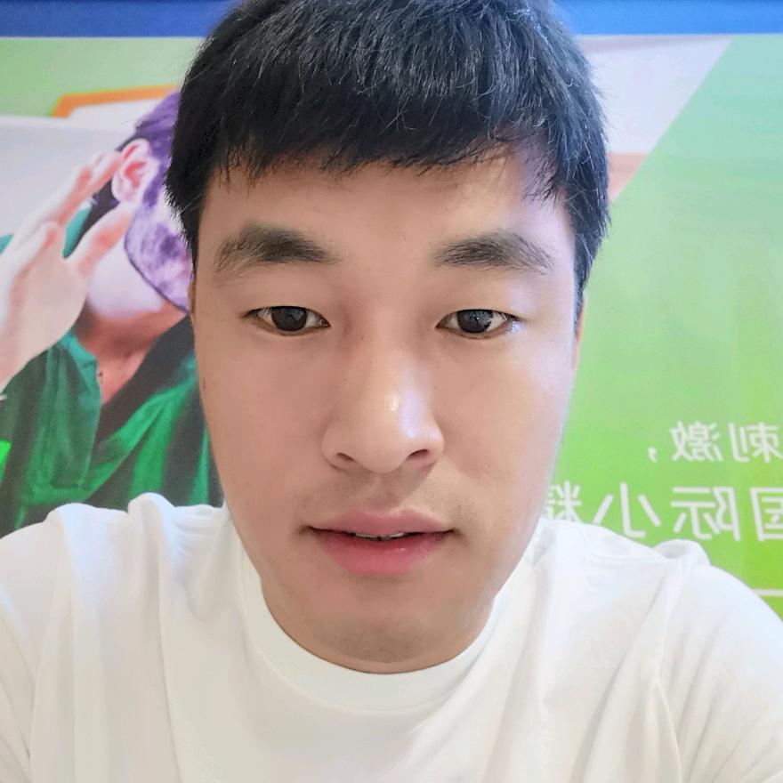 伟@