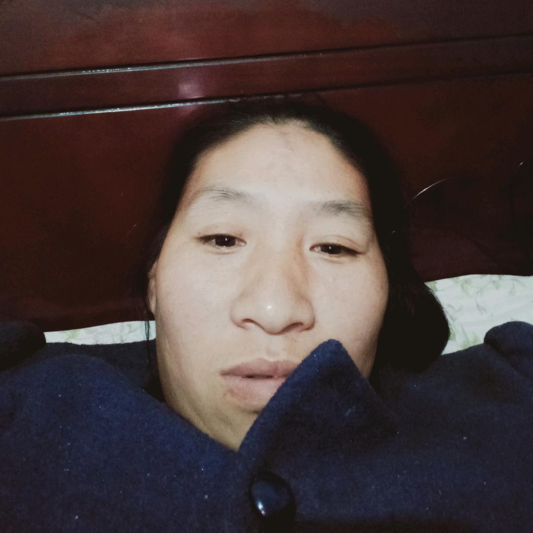 谭美