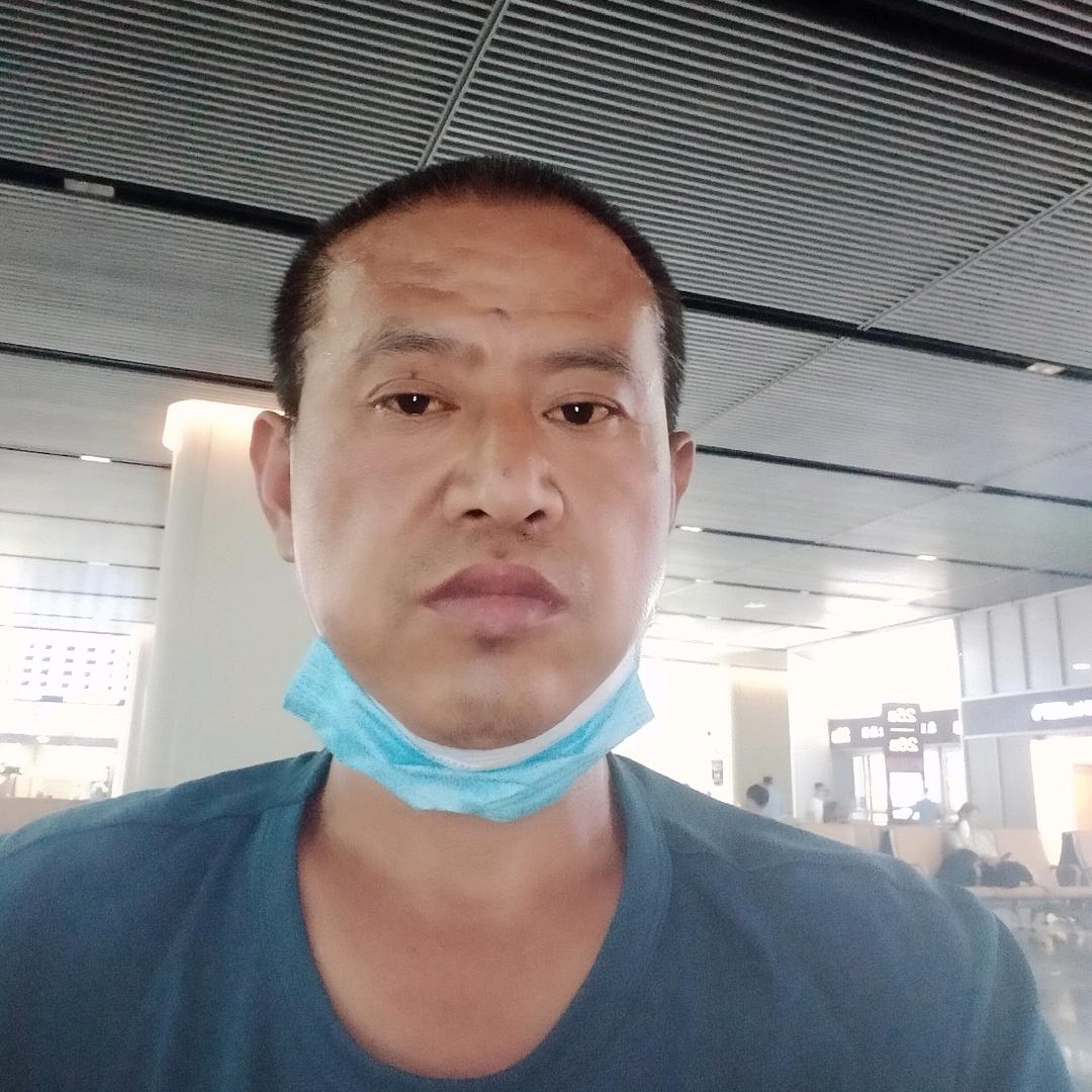 王明金，