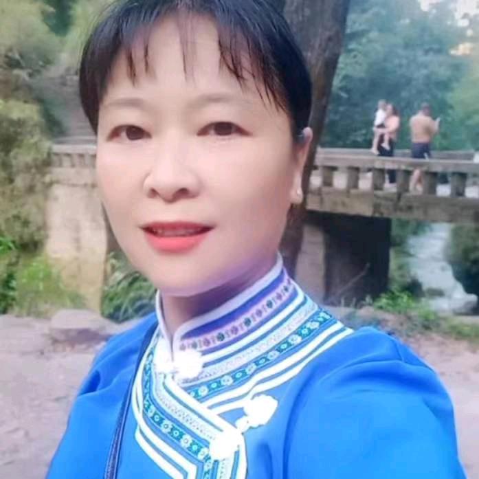 罗大姐。
