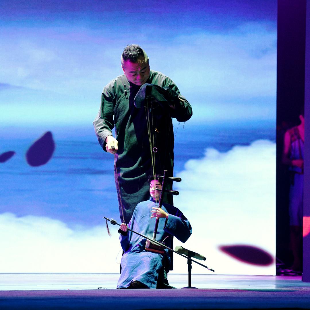 木偶拉琴(魏朝浩)