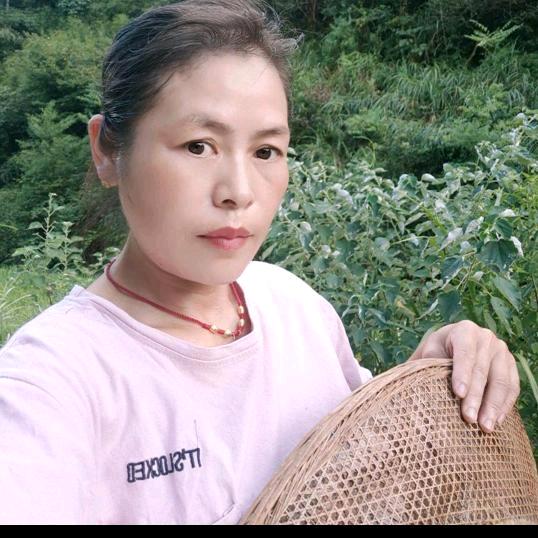 梁妹村暖记