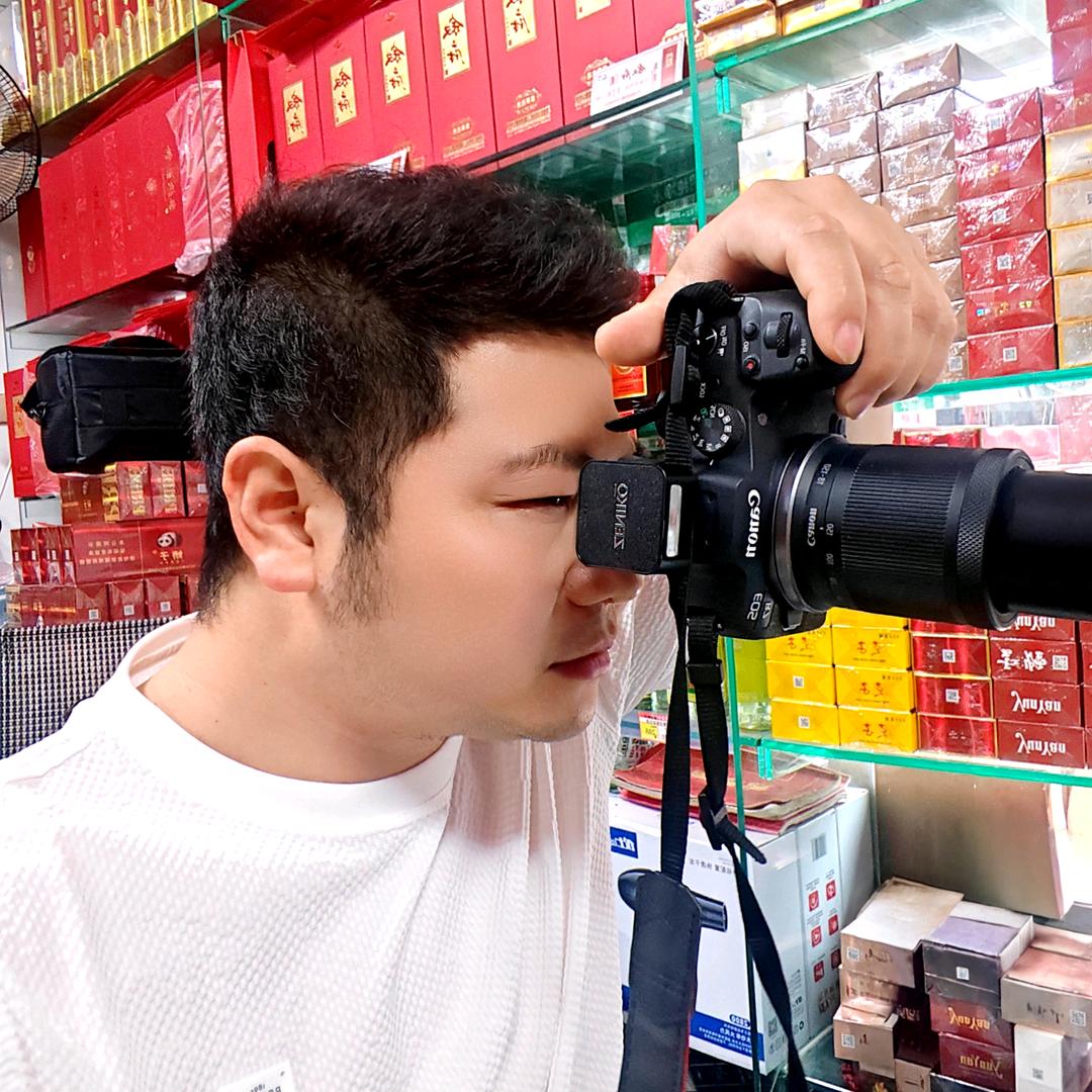 不会拍照的二甩