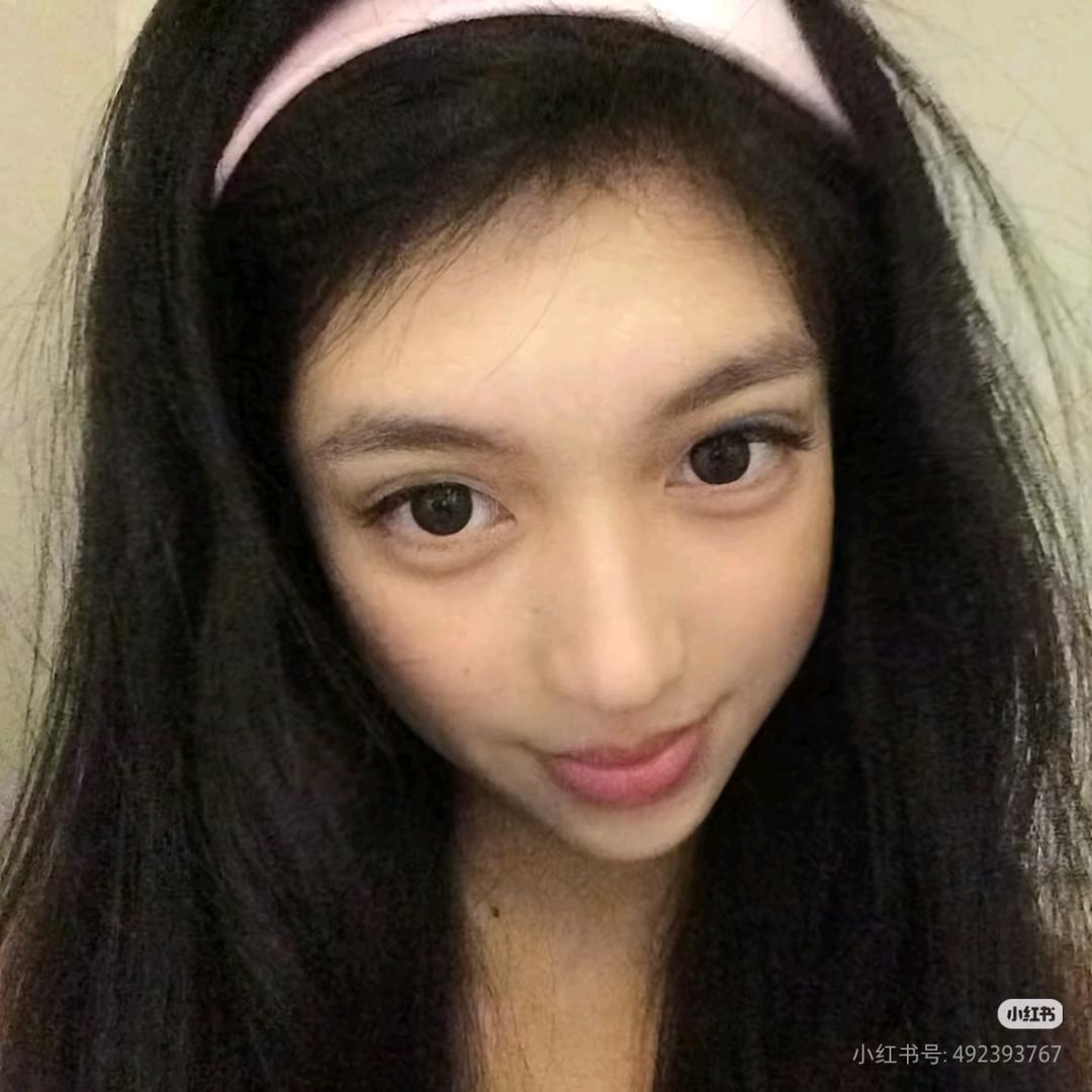 妮.