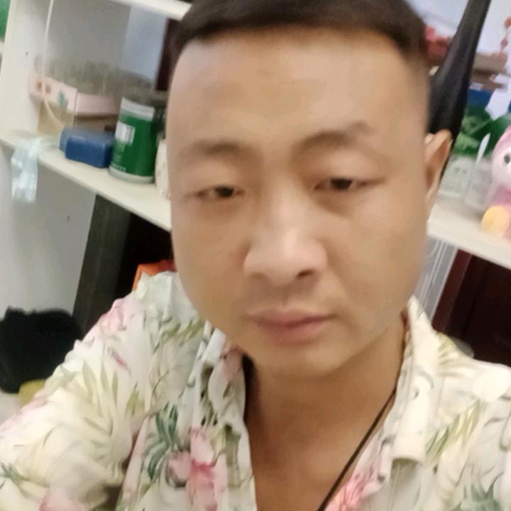 笑 天