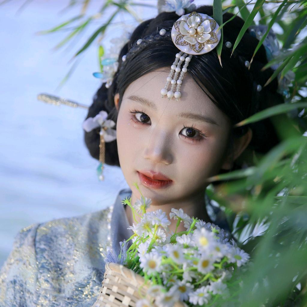某在斯
