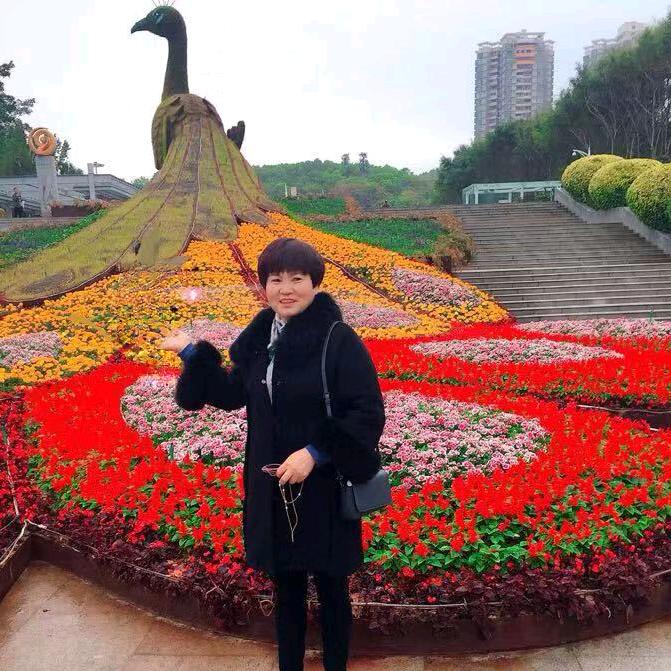 李华