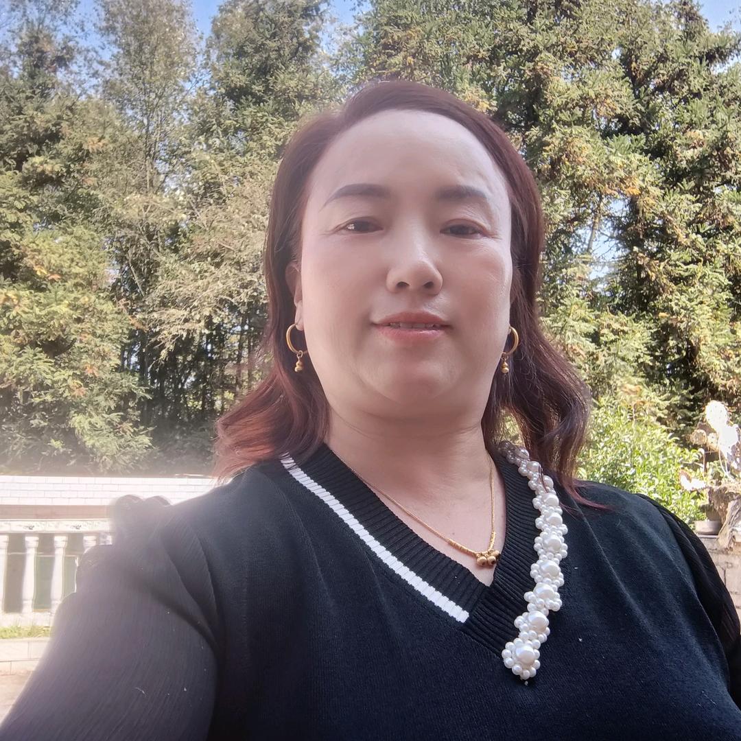 张群.