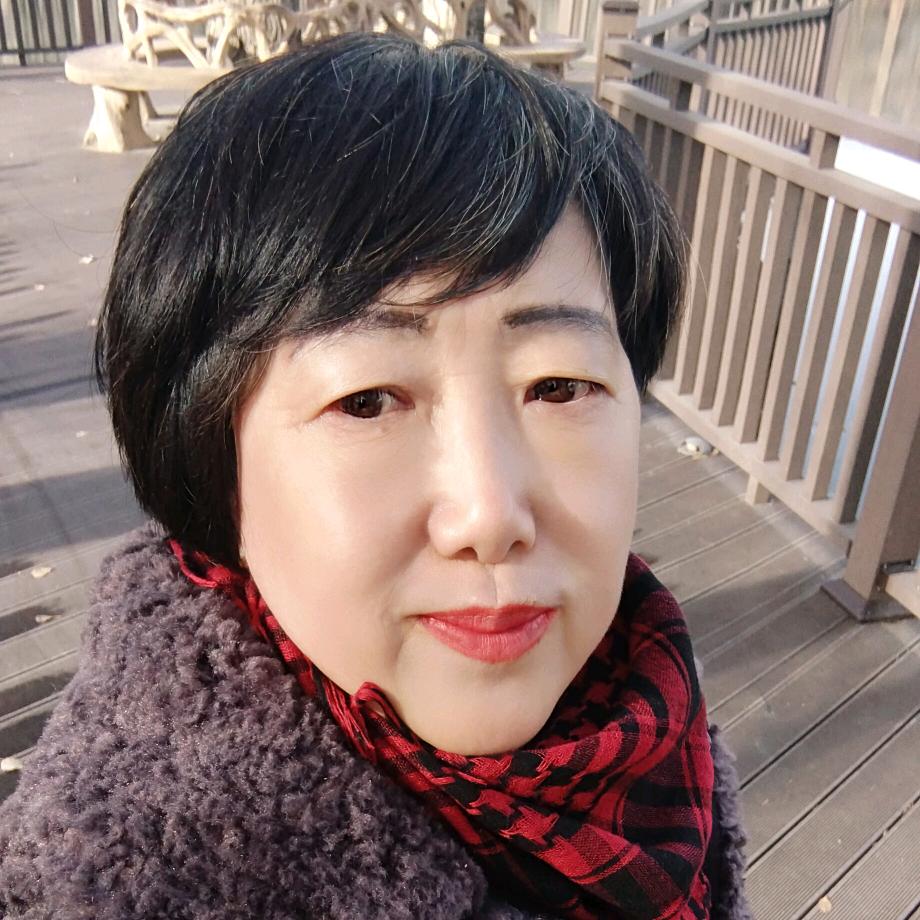 毛成春