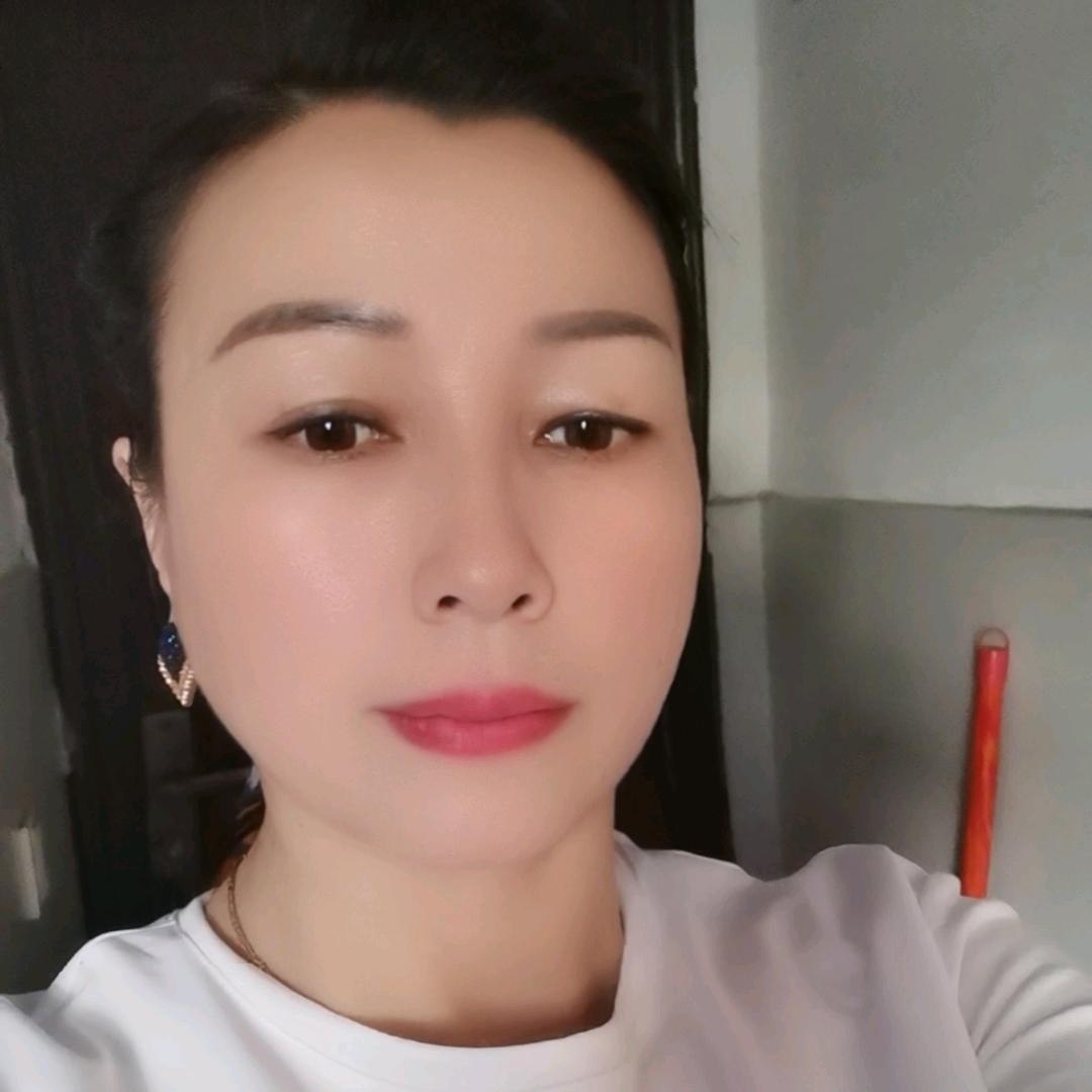 淡然一笑
