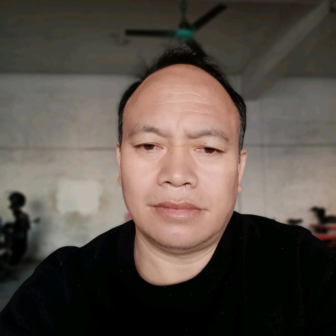 覃